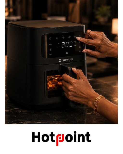 Promotional image of a Nutricook air fryer being operated with a Hotpoint logo below