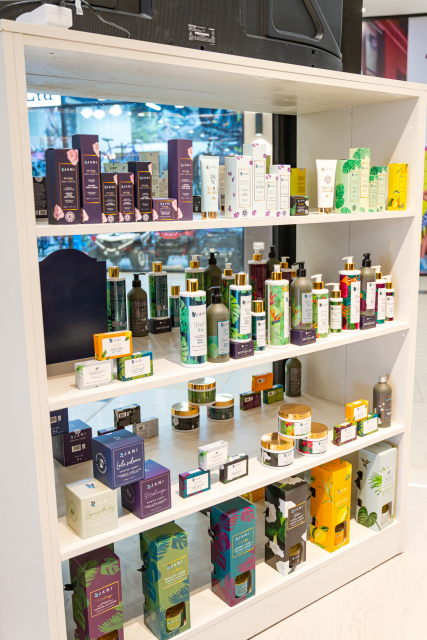 Multi-tier shelving filled with boxed and bottled personal-care products