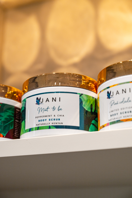 JANI Peppermint and Chia Body Scrub jars displayed on a shelf