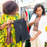 Connie Oluoch discusses black shorts while another woman holds them up during Style, Shop & Sip.