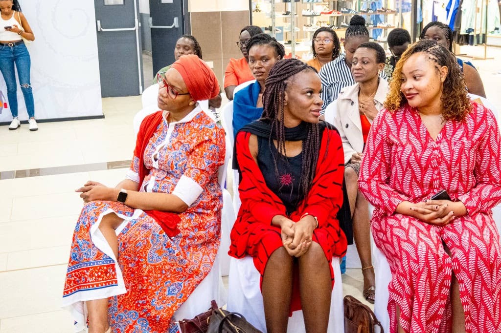 Guests sit together and listen during the Style, Shop & Sip event with Connie Oluoch.
