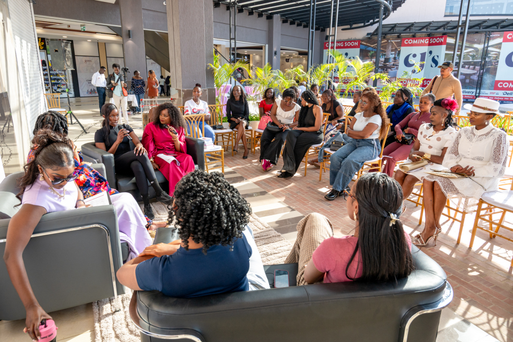Audience seated around a wellness discussion area inside Galleria Shopping Mall
