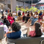 Wellness discussion audience at Galleria Audience seated around a wellness discussion area inside Galleria Shopping Mall