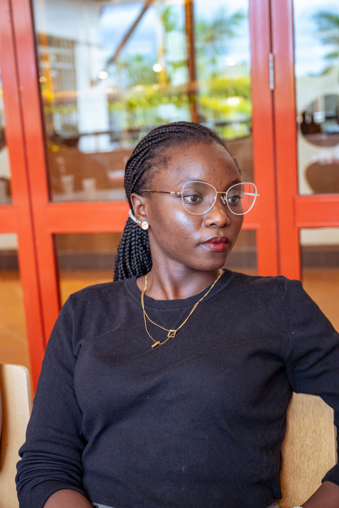 Portrait of a woman wearing glasses and a black top at the tasting event