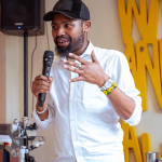 Speaker gestures while holding a microphone during a presentation